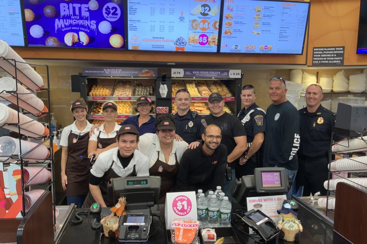 Dunkin'  Donuts Staff with Officers