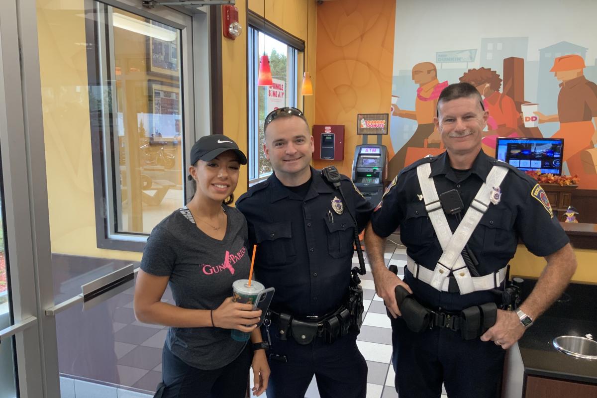 Woman with Two Officers